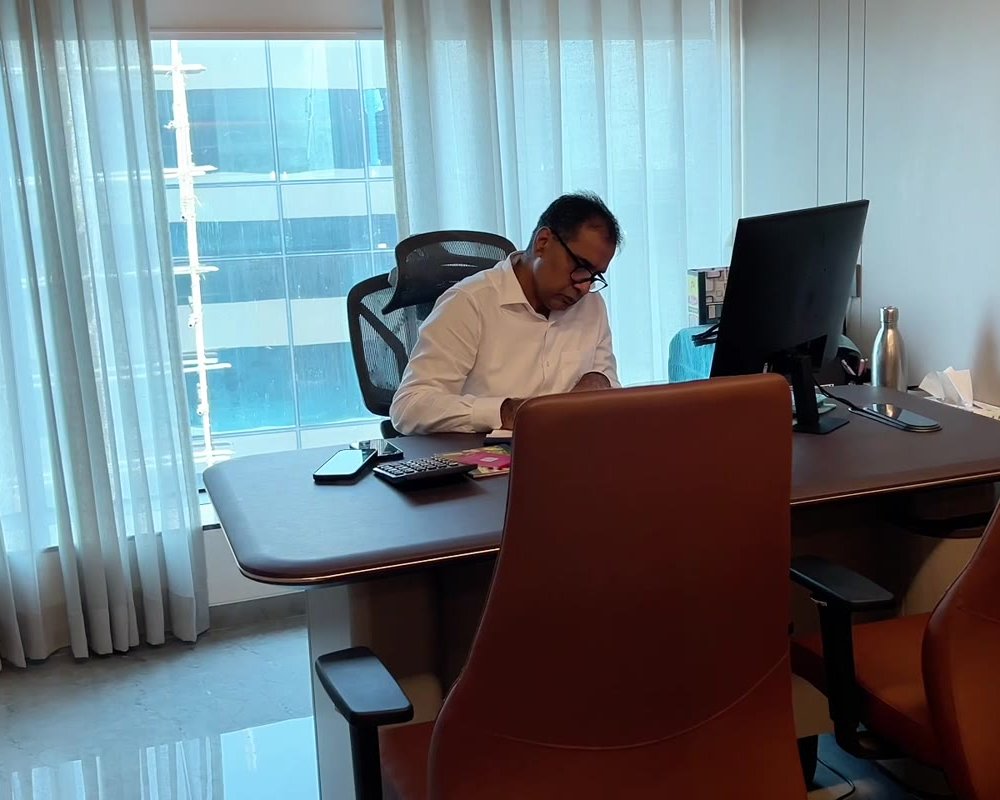 Dilip Tulsiani at his desk in our Surat office